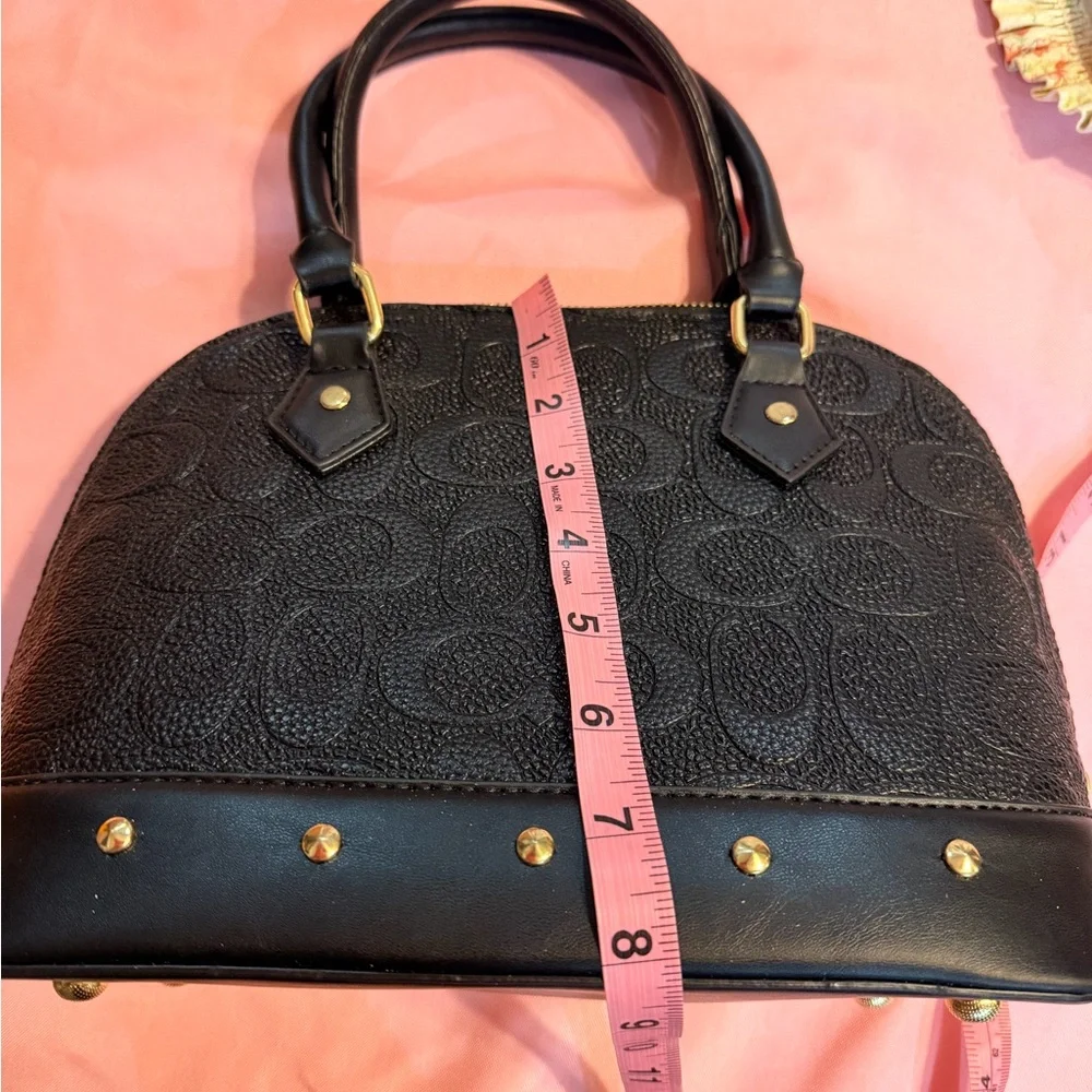 Elegant‎ Black Handbag with Gold Accents